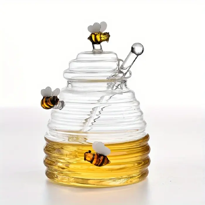 Pot à miel en verre avec cuillère et couvercle