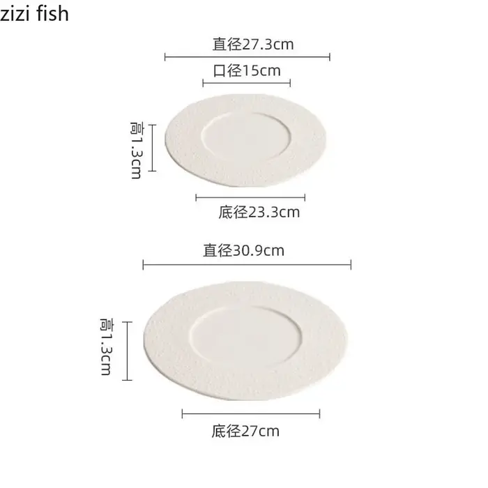 Assiette en céramique blanche à pois