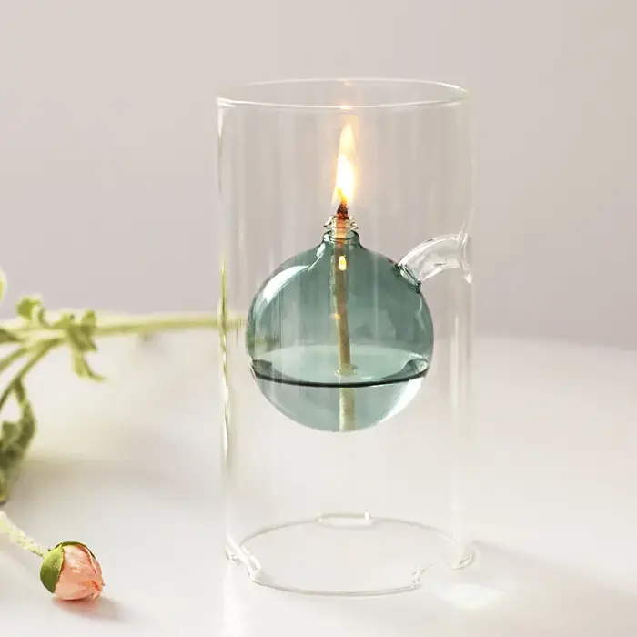 Lumière à huile en verre