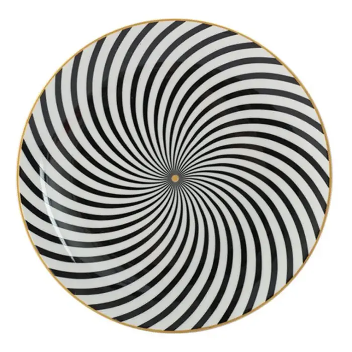 Assiette ronde avec incrustation dorée