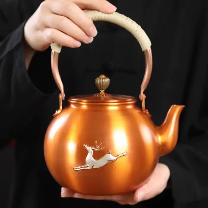 Théière en cuivre argenté doré faite à la main