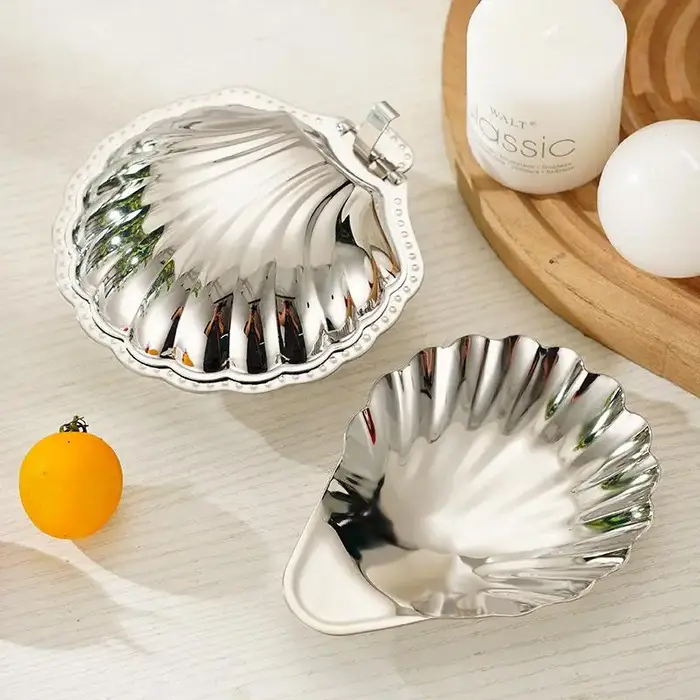 Assiette en acier inoxydable en forme de coquille