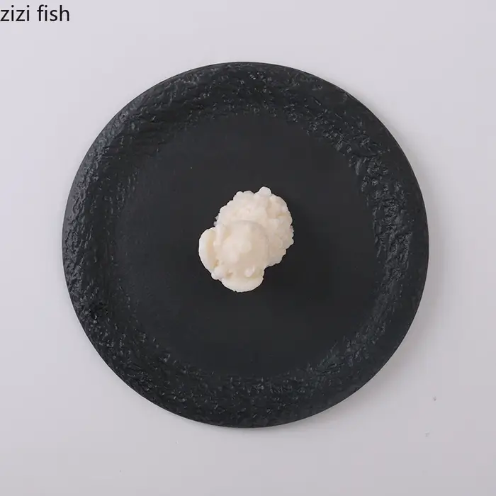 Assiette ronde en céramique noire