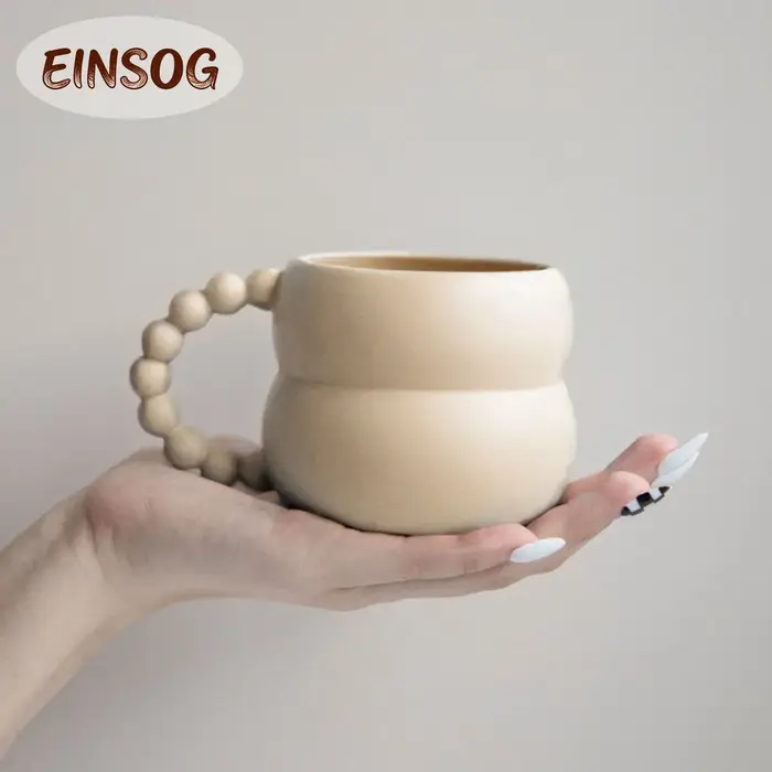Tasse à café en céramique avec poignée boule