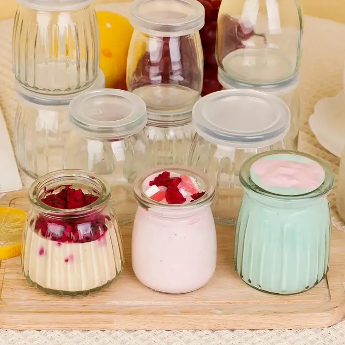 Bouteille en verre de Pudding avec couvercles PE