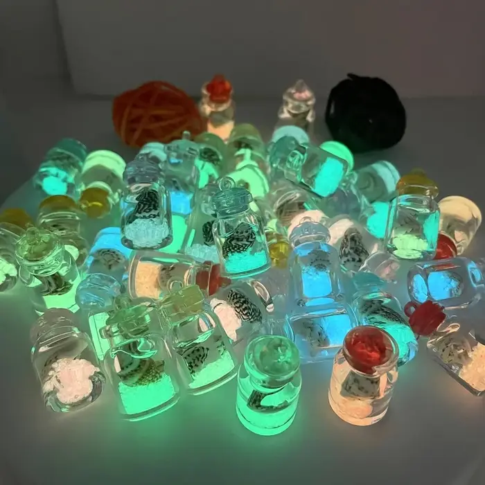 Conques lumineuses en bouteilles en verre transparent