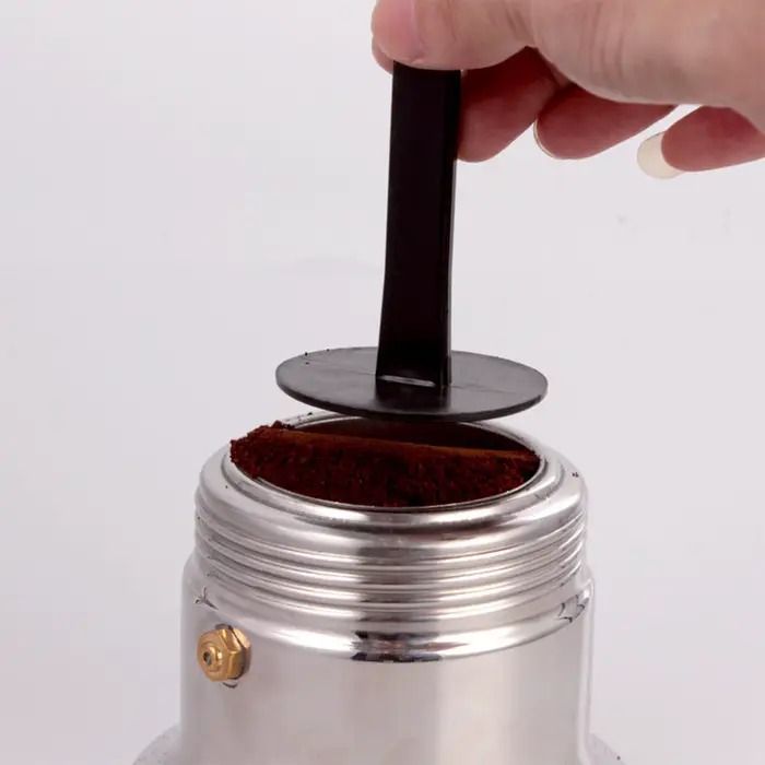 Cuillère doseuse et tasseur à café expresso – Outils essentiels pour mesurer et presser