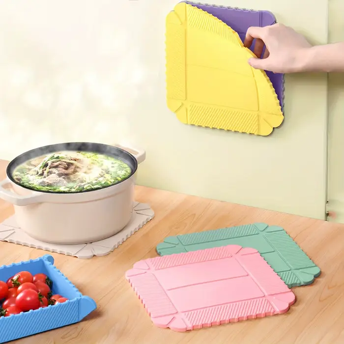 Sous-plats et dessous de plat pliables en silicone