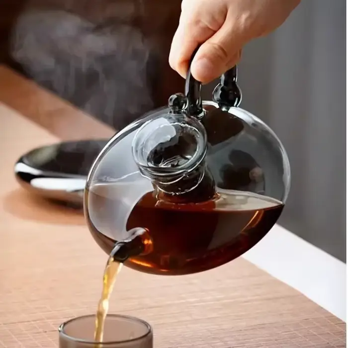 Théière en verre noir transparent
