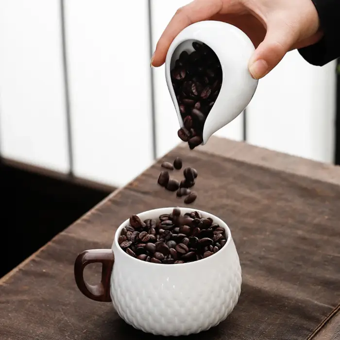 Plateaux de dosage de grains de café