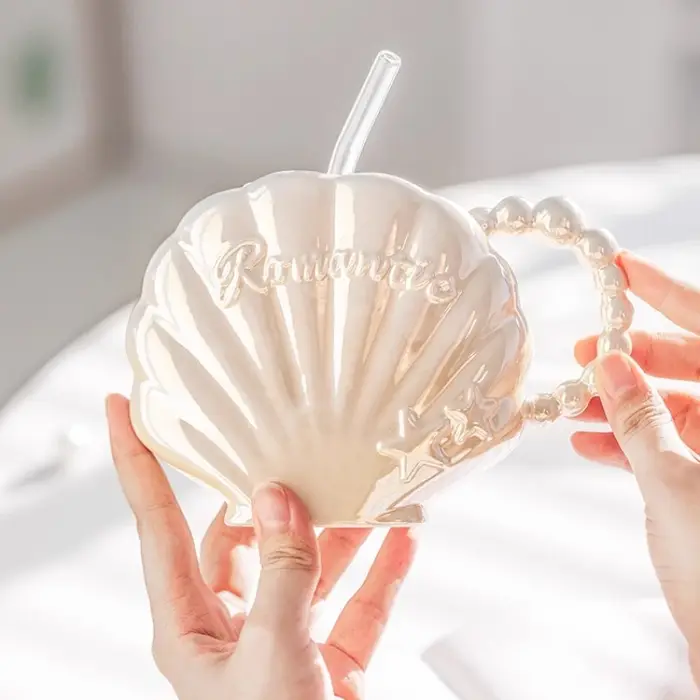 Tasse en céramique de coquille de perle haut de gamme avec paille