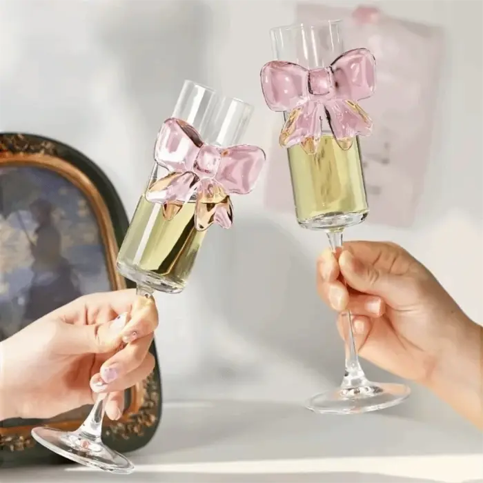 Verre à Champagne avec nœud rose clair