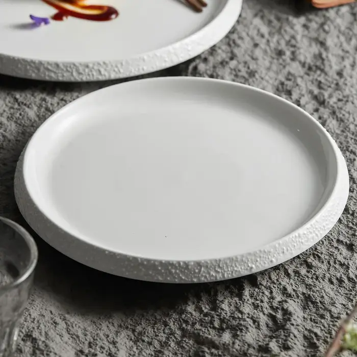 Assiette occidentale à steak de cuisine artistique en porcelaine blanche