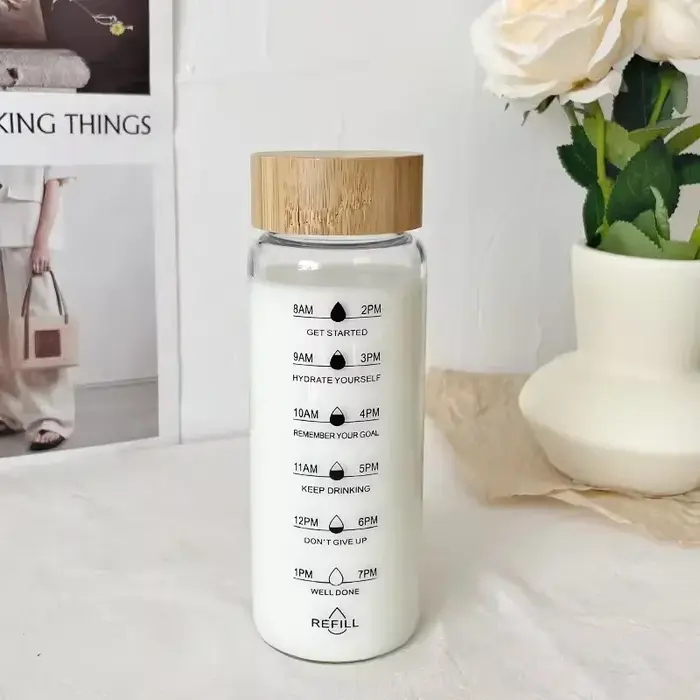 Bouteille d'eau en verre de grande capacité