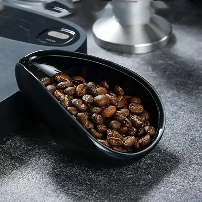 Tasse à mesurer les grains de café
