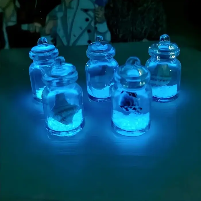 Conques lumineuses en bouteilles en verre transparent