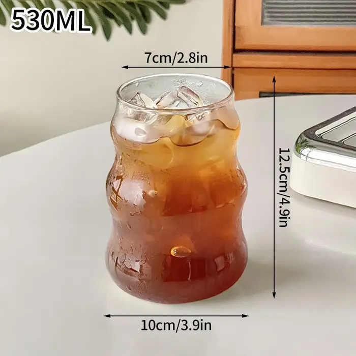 Verre à boire transparent en forme de vague créative