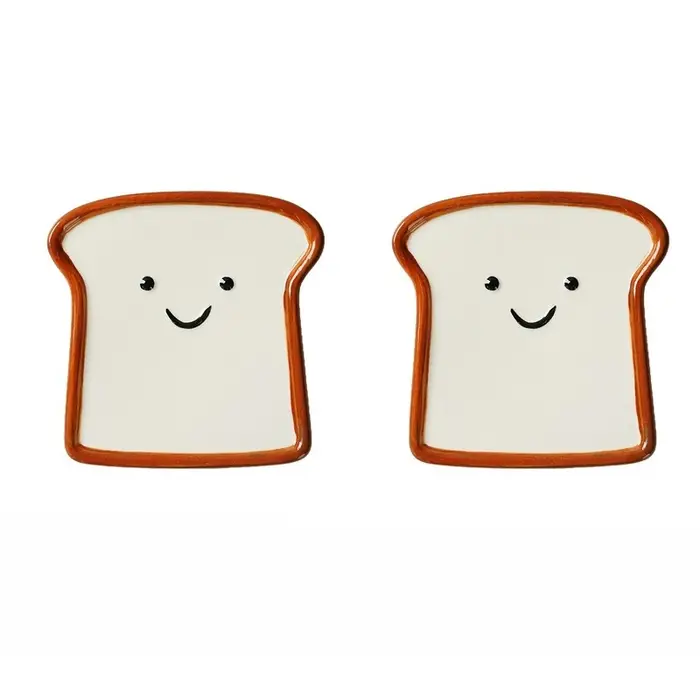 Assiettes en céramique en forme de pain grillé souriant