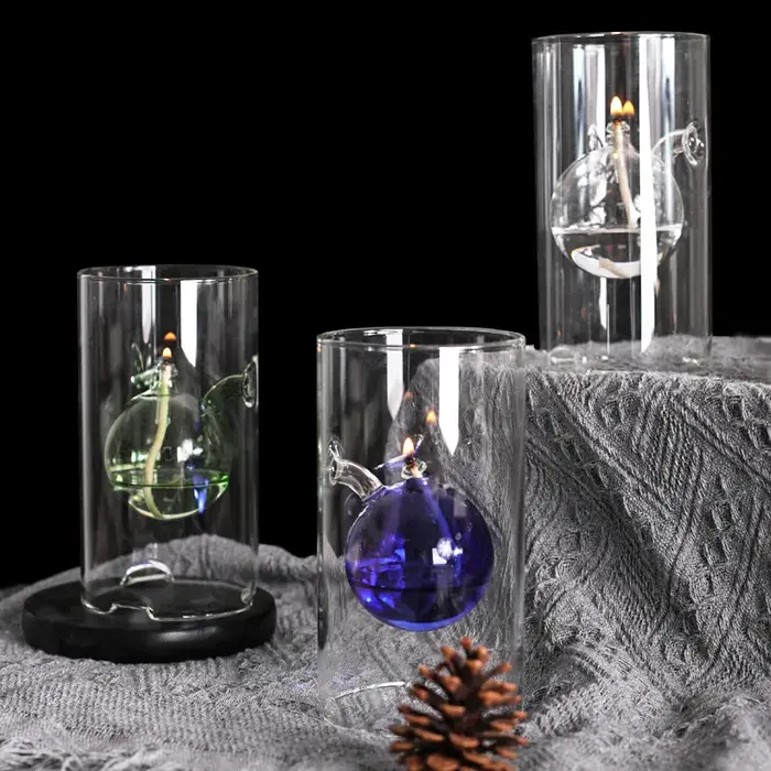Lumière à huile en verre