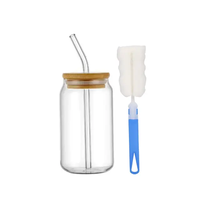 La tasse à boire en verre de 16 oz est livrée avec un couvercle en bambou et une paille