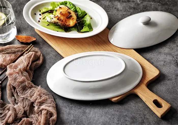 Vaisselle elliptique ovale en céramique assiette blanche plat avec couvercle tasse à légumes hôtel créatif restaurant fromage cuit riz bol profond
