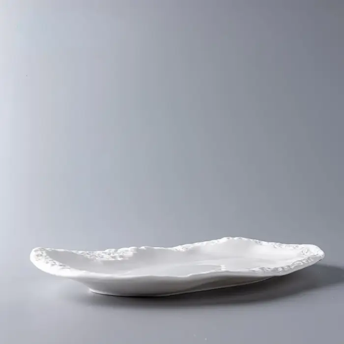 Assiette de nourriture occidentale en céramique avec motif de pierre