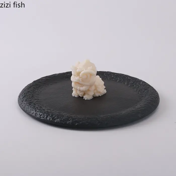 Assiette ronde en céramique noire