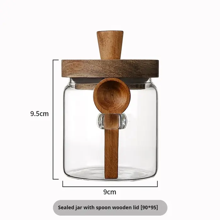Bocaux en verre de cuisine avec couvercles et cuillère en bois