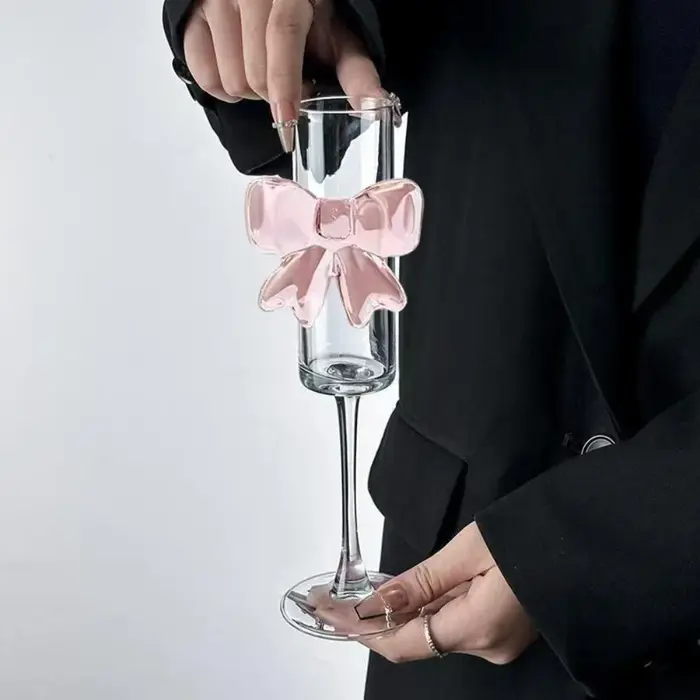 Verre à Champagne avec nœud rose clair