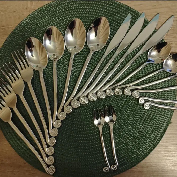 Couverts impressionnants, Design créatif célèbre, poignée d'escargot, service de vaisselle, processu