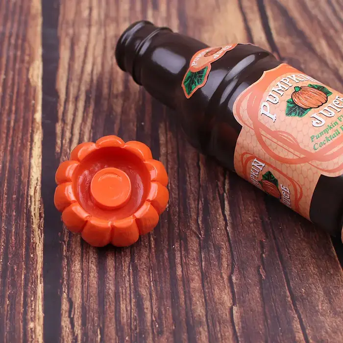 Ornements de table créatifs de bouteilles de jus de citrouille
