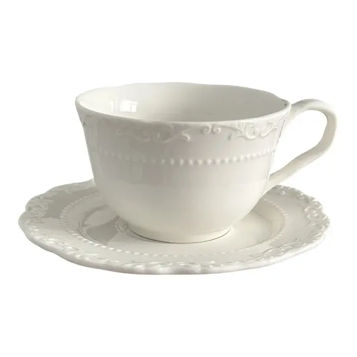 Ensemble de tasses à café et assiettes à fleurs en relief