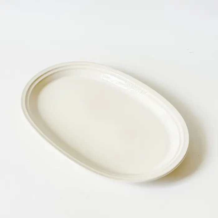 Assiettes de service ovales en porcelaine