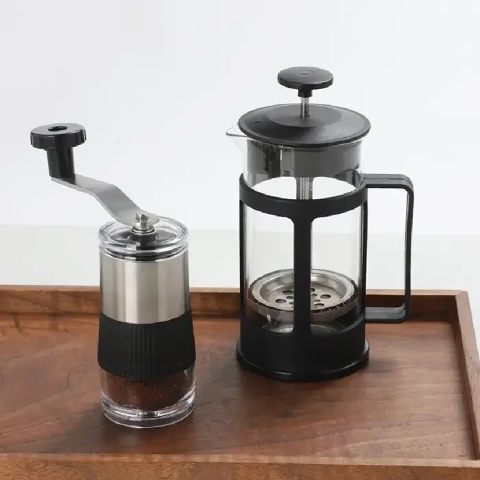 Nouveau mini moulin à café manuel portable en acier inoxydable