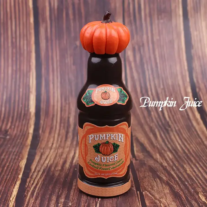 Ornements de table créatifs de bouteilles de jus de citrouille